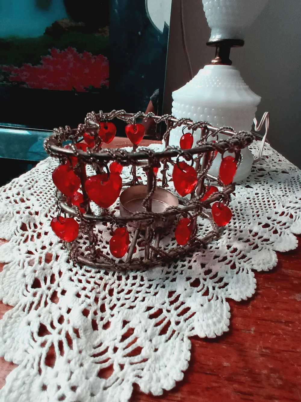 Handcrafted Metal Candle Holder with Red Glass Accents